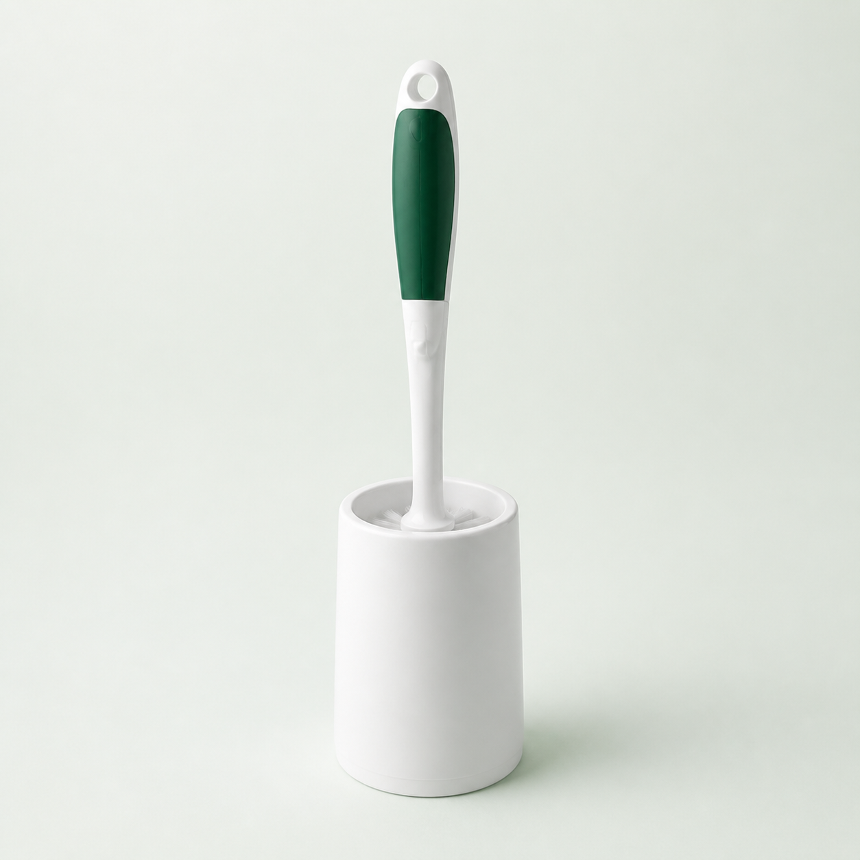 White and green toilet brush with holder